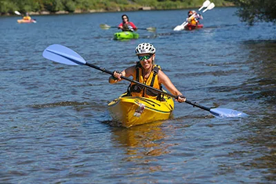 A kayaker on the paddle leg of the American River